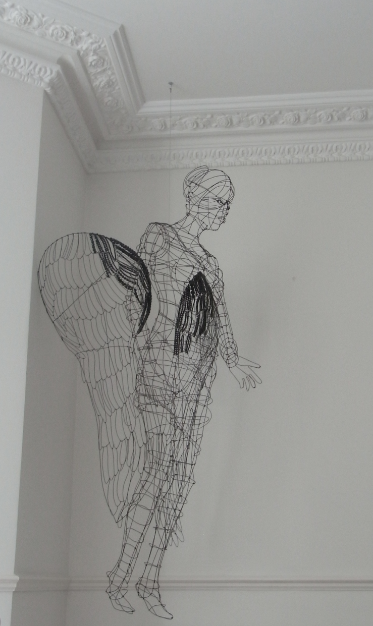 Wire angel sculpture installation
